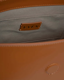 Interior view of the BELONA Hobo Bag by Even, showcasing premium calfskin leather and the Even brand tag.