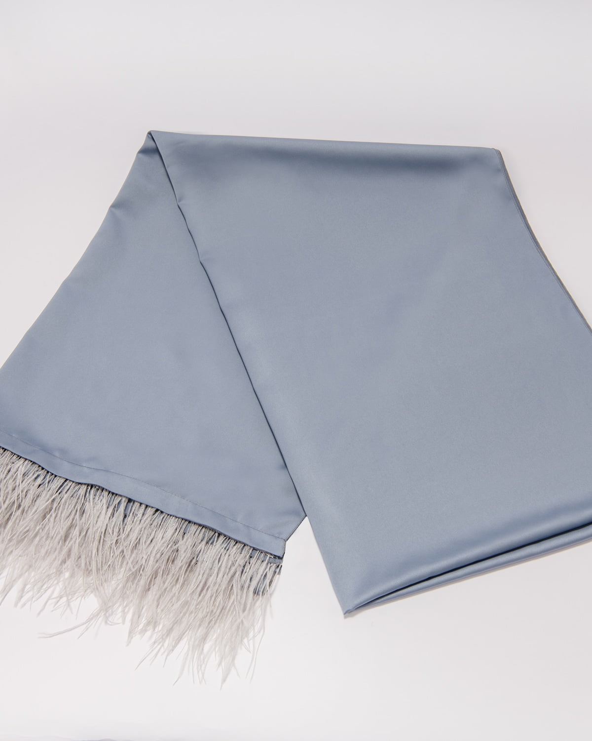 Elegant blue satin Eride scarf, soft and luxurious fabric, perfect accessory for any outfit. Stylish and versatile, ideal for adding a pop of color. 