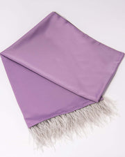 A purple scarf with ostrich feather fringe displayed on a plain background.