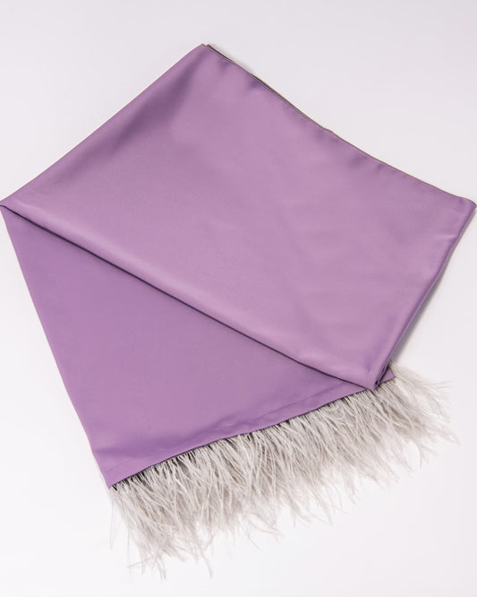 Soft purple satin Eride scarf, a delicate and luxurious accessory that adds a feminine touch to any outfit. Perfect for adding a pop of color with elegance.