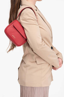 Luisa mini bag in red color in grain leather by EVEN brand.