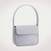 Luisa gray mini bag with a sleek and minimalist design, featuring a single handle and a brand logo embossed on the front.