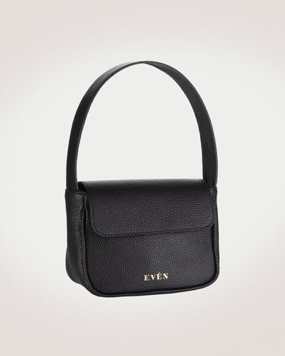 Front design image of mini handbag in black grain leather with gold even logo.