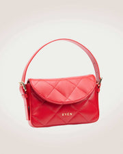 A red Kate Baguette Mini Bag with a quilted design, a shoulder strap, and a brand logo visible on the bottom corner.