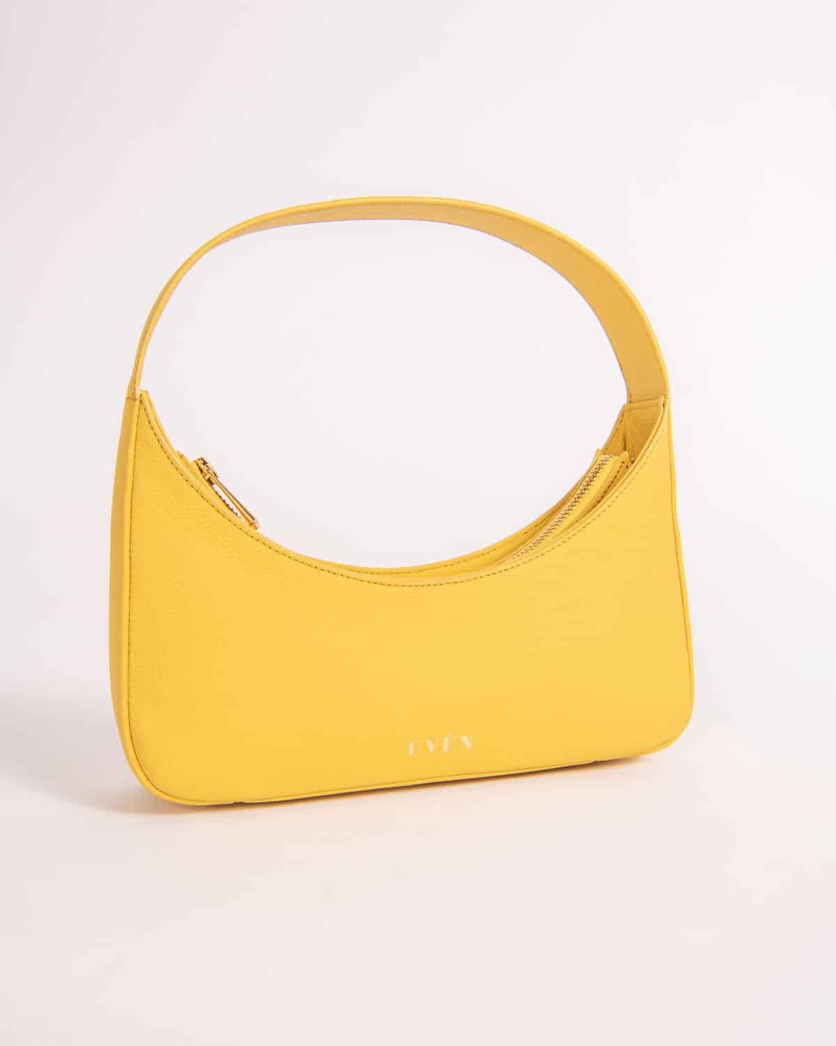 Zoe mini baguette bag in yellow crafted by EVEN brand.