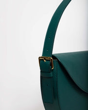 Gaia mini bag green blue leather handle with gold hardwear.