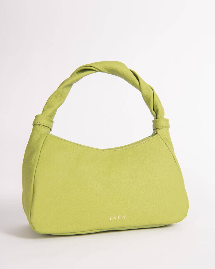 A light green colored mini tote handbag with a triangular shape and a shoulder strap.