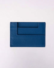 Back view multiple card slots of Muzi cardholder in dark blue leather.