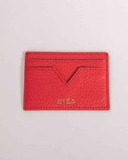 Red Muzi cardholder made of calfskin leather with multiple card slots, displaying the brand name 'EVEN' embossed on the bottom.