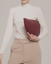 Minimalist luxury leather accessories in neutral tones