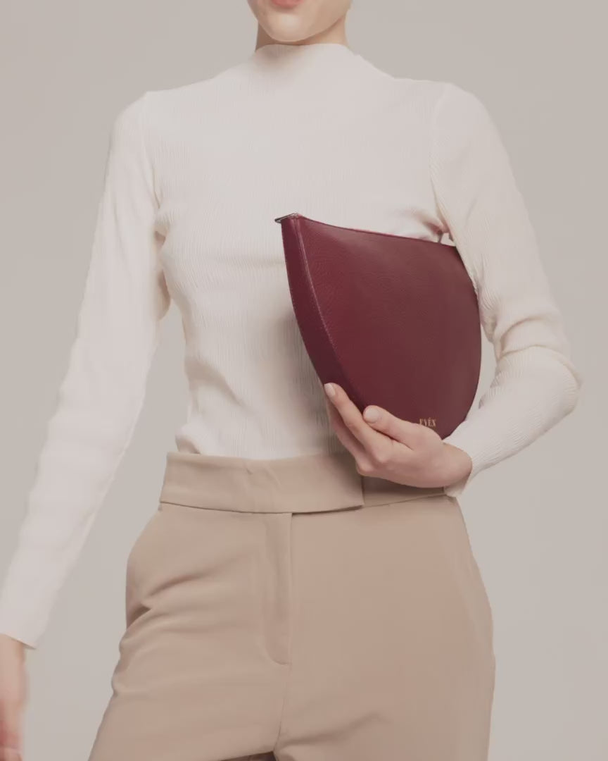Minimalist luxury leather accessories in neutral tones