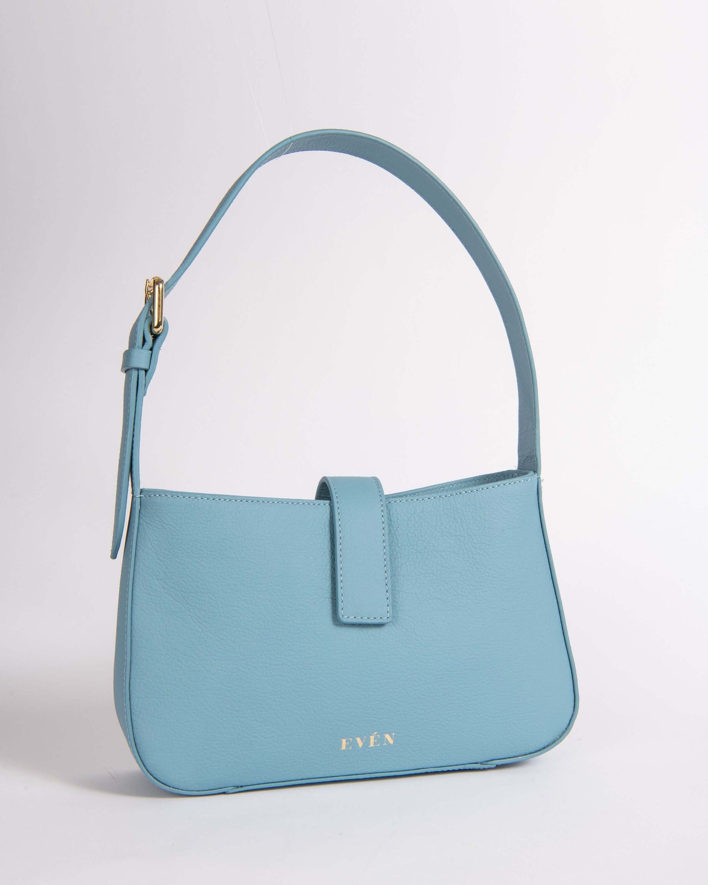 valenta handbag in light blue textured leather with magnetic closure and gold tone even logo at the bottom