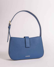 A dark blue leather Valenta handbag with a sleek design, featuring a main compartment and a smaller front pocket, with a gold-tone hardware closure.