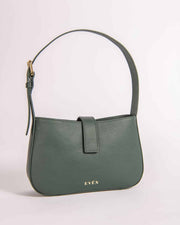A dark green VALENTA baguette handbag with a front flap and chain strap, displayed against a plain background.