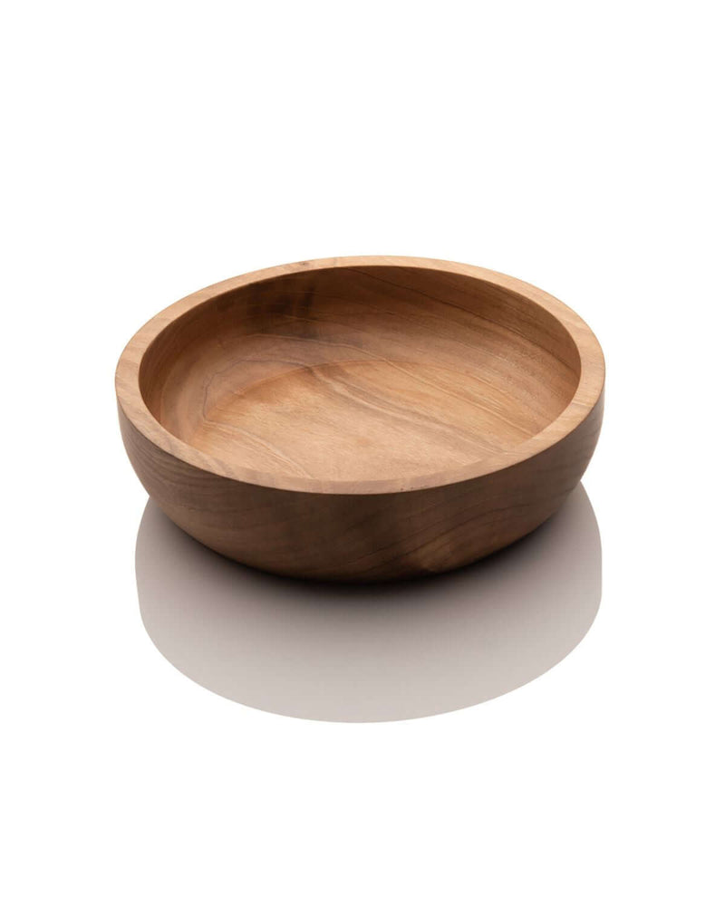 A handcrafted walnut wood salad bowl with a smooth finish and visible wood grain, pictured on a white background.