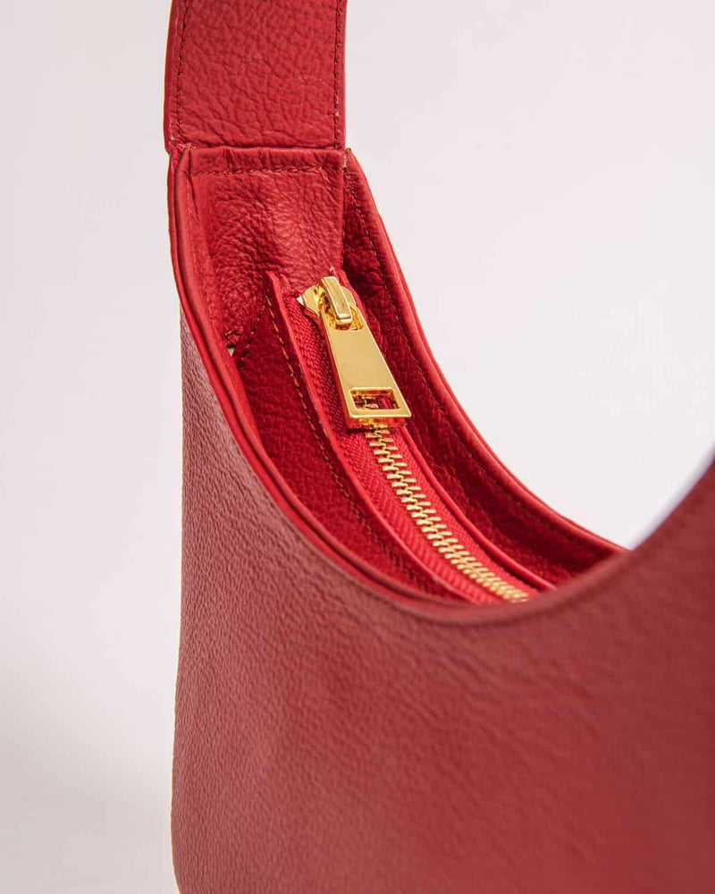 ZOE red baguette mini bag front view - sustainable leather 