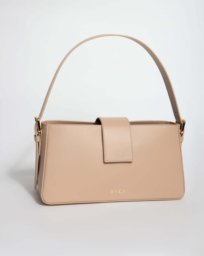 A beige BELONA Hobo Bag made from premium calfskin leather, featuring an adjustable shoulder strap and a gold-tone logo.
