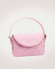 Kate quilted pink leather mini bag with a structured silhouette and a golden metal clasp, photographed against a neutral background.