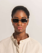 Rectangular wooden sunglasses JUNTA with dark lenses modeled front view