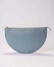 Blue-grey LEYZA clutch made from genuine leather, presented in a semi-circular shape with a zipper closure.