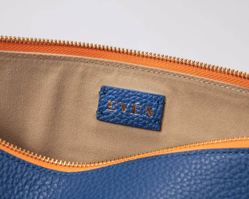  "LEYZA dark blue leather clutch side profile view - premium women's evening accessory sustainable fashion European made"